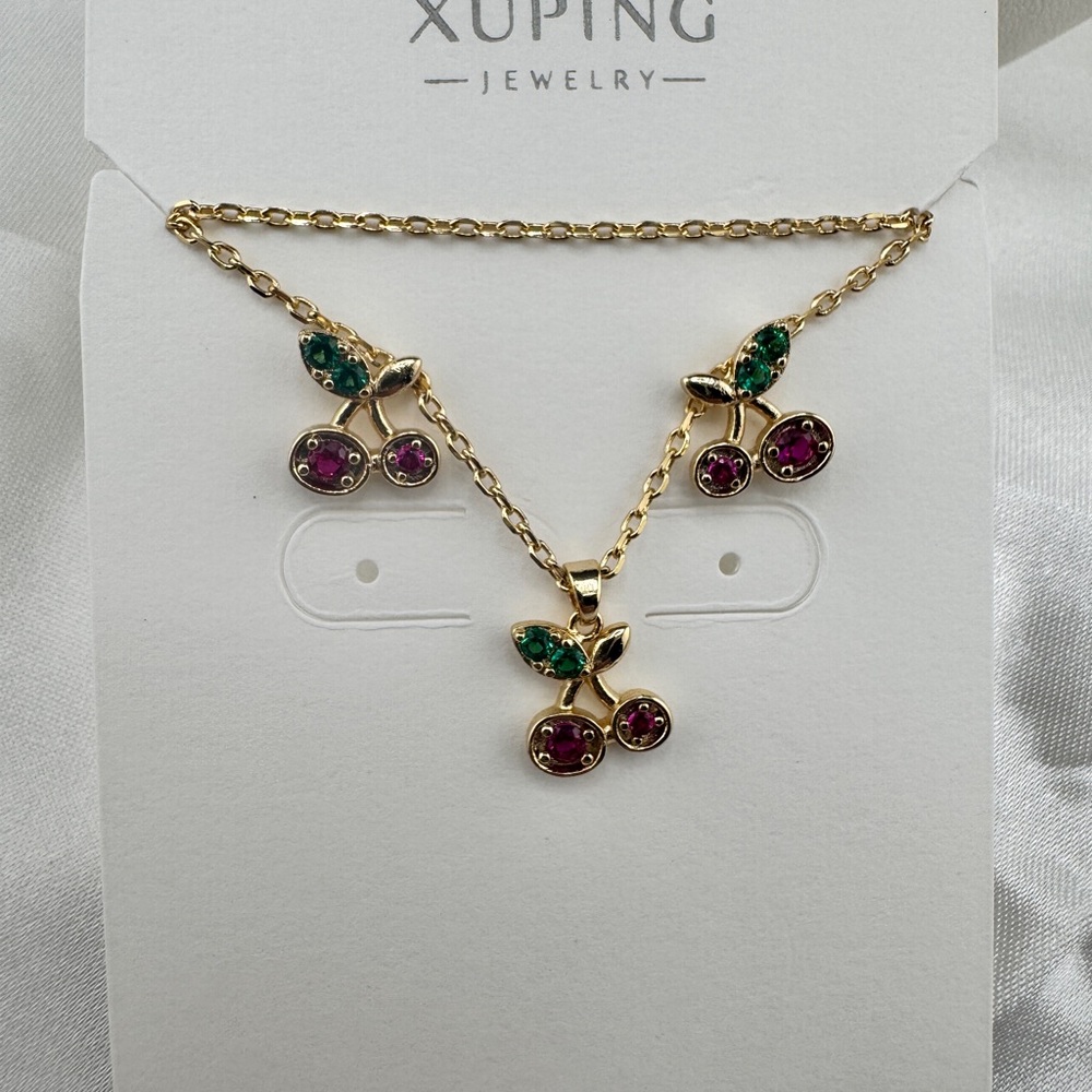 Ping Gold Cherry Necklace with Red and Green Accents‎
